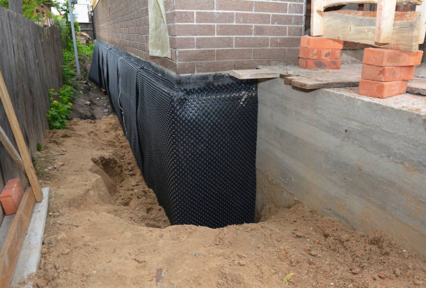 Happy homeowners after waterproofing job in Peshtigo